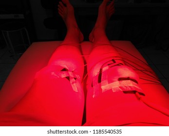 Heating Infrared Physio Therapy Light Used To Both Knees