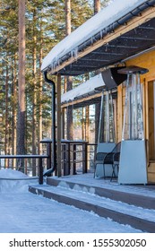 Heating Lamp Placed Among The Tables Of An Open Cafe In Winter During The Day.stainless Steel Metal Gas Heater For Patio.High Outdoor Gas Heater On The Open Terrace Of The Cafe, Home Or Restaurant