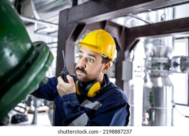 Heating Plant Employee Checking Water Temperature During Winter Season.