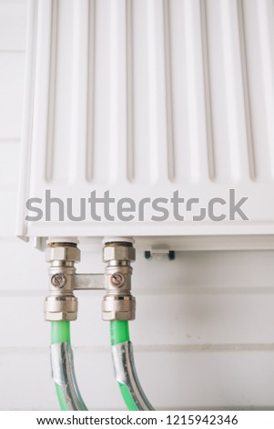 heating radiator with bottom connection pipes