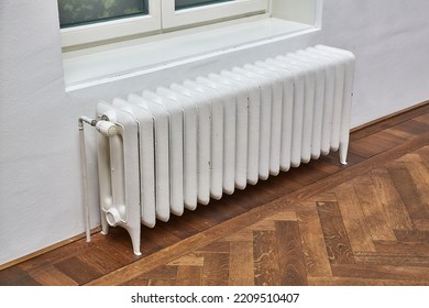 Heating radiator in an indoor space - Shutterstock ID 2209510407