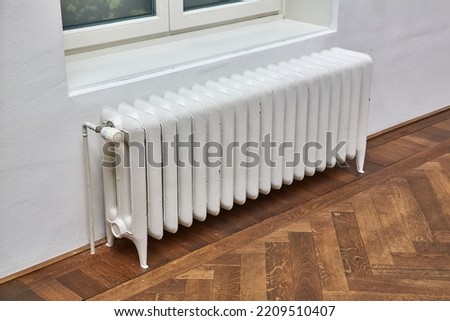 Heating radiator in an indoor space