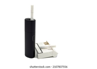 Heating Tobacco System On  White Background. Newest Electronic Cigarette. IQOS Tobacco Heating System. Heat Not Burn Tobacco Products.