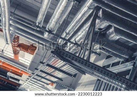 Heating, Ventilation and Air Conditioning System Installation. Commercial Building HVAC Ducts Pipeline. Temperature Control Technology.