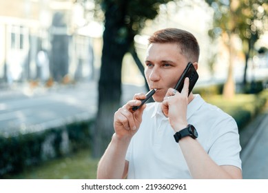 A Heat-not-burn Tobacco Product Technology.Man Holding In One Hand Smoking Module