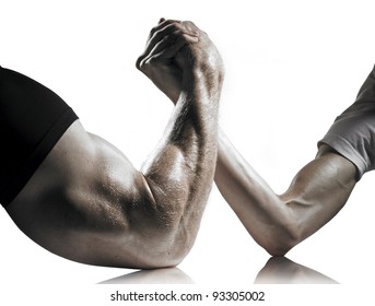 A Heavily Muscled Man Arm Wrestling A Puny Weak Man