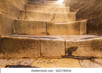 Heavily worn steps of a stairs in Church o a Holy Sepulchre, Jerusalem - Shutterstock ID 1621744516