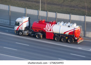 Heavy Big Fuel Tanker Truck Luckoil Company On City Highway. Russia, Saint-Petersburg. 16 April 2020