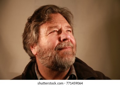 Heavy Built 60 Year Old Bearded Man In Profile