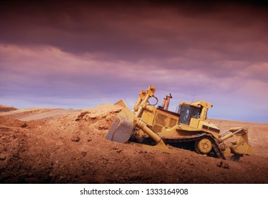 Heavy Bull Dozer Pushing Dirt