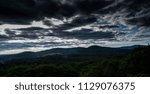 Heavy Clouds Over The Mountain