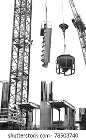 Heavy Crane And Derrick Machinery Hoist Lifting Concrete Mixer And Building Foundation.