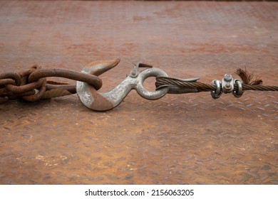 Heavy Duty Chain And Hook On A Big Metal Flatbed Truck, Rusty, Weathered, Towing, Strong, Thick