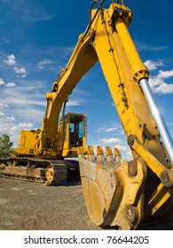 Heavy Duty Construction Equipment Parked At Worksite