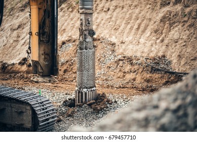 heavy duty machinery used for drilling holes in the ground on construction site. Highway building details with rotary drilling machine 