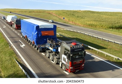 Heavy Duty Tractor Unit With Push-pull MAN TGA 41.660 8X4-4 By QuickPort Logistics Estonia. Logistics Of Transportation Of Heavy And Oversized Cargo By Road. Belarus, Minsk, Sept 14, 2021. 