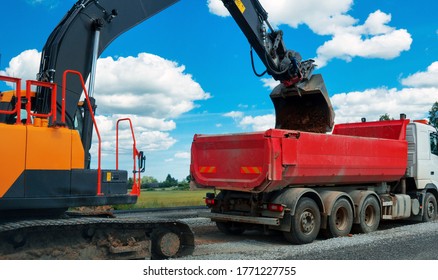 Heavy equipment works in the air. Road reconstruction - Shutterstock ID 1771227755