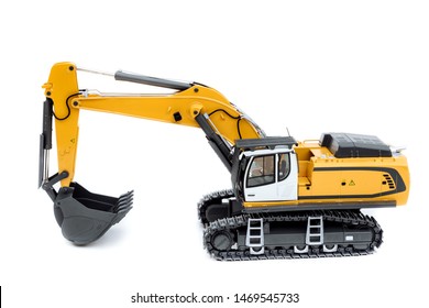 Heavy Excavator. Excavator Model Toy. Construction Machinery, Isolated On White Background