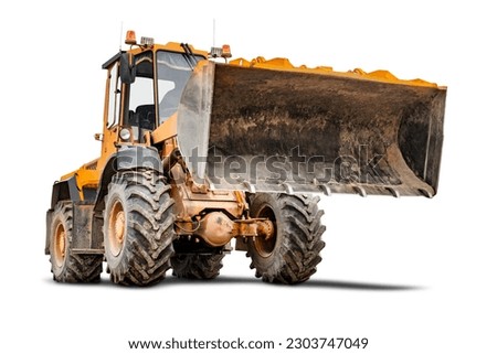 Heavy front loader or bulldozer on a white isolated background. construction machinery. Transportation and movement of bulk materials. Large bucket for earth, sand and gravel