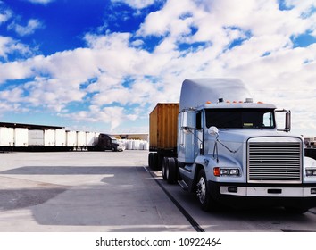 Heavy Goods Truck Leaving Loading Bay - This Image Has Been Cross Processed