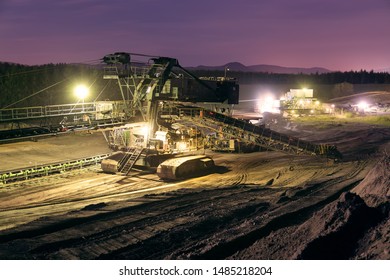 Heavy Industrial Machine In Coal Mine In The Night