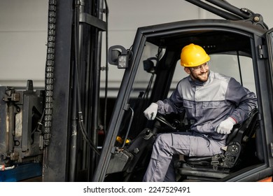 A heavy industry driver is driving forklift and distributing raw materials. - Powered by Shutterstock