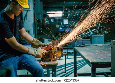 Heavy Industry Manual Worker With Grinder Background, Asian Man Wearing Mask With His Hands Grinding In Heavy Industry