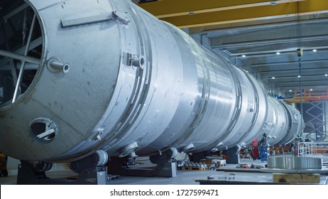 Heavy Industry Manufacturing Facility / Factory Where Large Diameter Pipe Is Being Assembled. Modern Industrial Manufacturing Technology To Design And Construct Oil, Gas And Fuels Transport Pipeline.