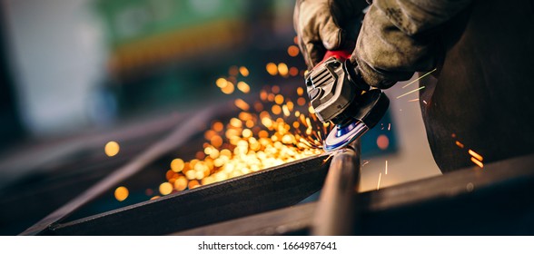 Heavy Industry Worker With Grinder