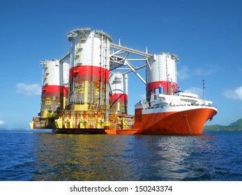 Heavy Lift Cargo Ship Transporting An Oil Rig