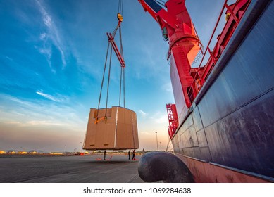 Heavy Lift Packages Cargo Shipment Lifting By The Jumbo Ship Crane For Delivery And Transport To Destination By Sea And Lands Logistics Services