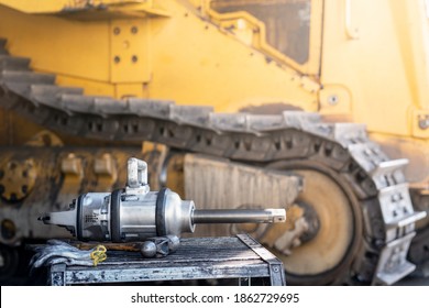 Heavy Machinery Maintenance And Repair, Air Wrench Torque Gun On Aluminium Stair In Workshop