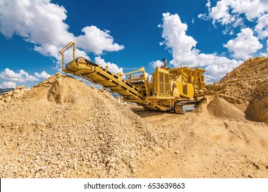 Heavy machinery in a quarry doing work