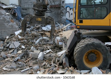 Heavy Machinery Tearing Down Condemned Building Stock Photo 1063168 ...