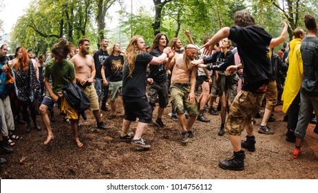 Heavy Metal Fans In A Mosh Pit Enjoying In Concert Of Their Favorite Band At Metaldays Festival On July 24th, 2017 In Tolmin, Slovenia