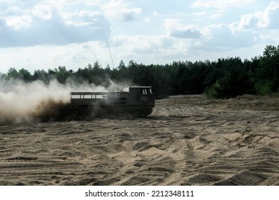 Heavy Military Vehicles On The Training Ground