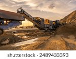 Heavy and mobile machinery in a quarry to transform stone into construction material