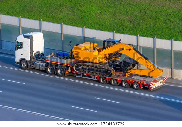 Heavy New Yellow Excavator On Transportation Stock Photo (Edit Now ...