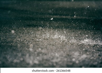 Heavy Rain Drops On Asphalt.