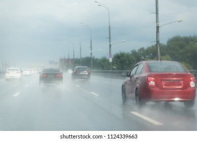 Heavy Rain Highway Traffic. Extreme Road Conditions. Rainy Weather Driving.