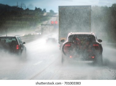 Heavy Rain Highway Traffic. Extreme Road Conditions. Rainy Weather Driving.