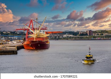 Heavy red tanker at port in Saint John, New Brunswick, Canada