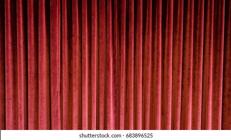 Heavy Red Velvet Curtain In Old Fashioned Theatre