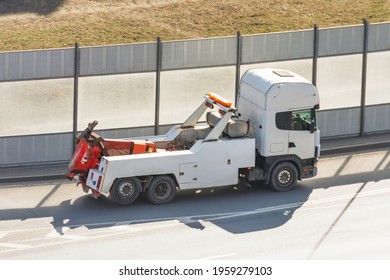 Heavy Semi Tow Big Rig Truck Tractor Driving On City Highway