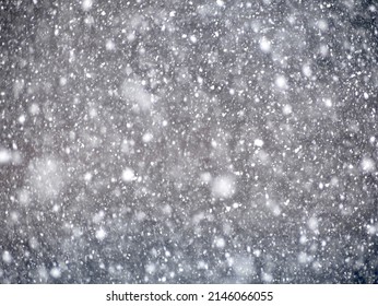 heavy snow fall with dense flakes falling down 