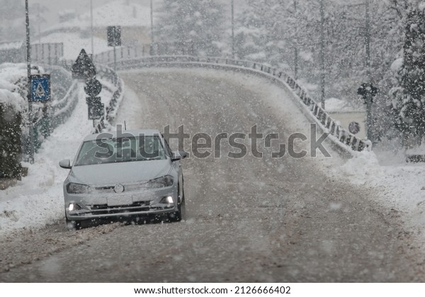 Heavy Snow Fall in North Italy . Pergine Valsugana,\
Italy on February 15, 2022. Winter conditions with heavy snowfall\
are back in Trentino South Tyrol, North Italy. Traffic\
perturbations occured. 