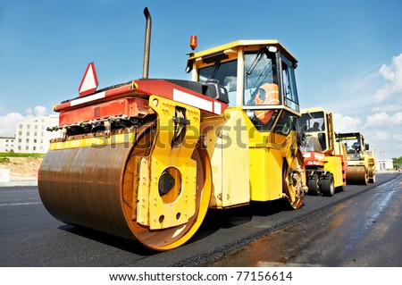 Similar – Image, Stock Photo Road building machinery, asphalt paver with level sensors for good road evenness, ultrasonic measuring accuracy