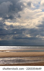 Heavy And Threatening Skies Over The Beach 