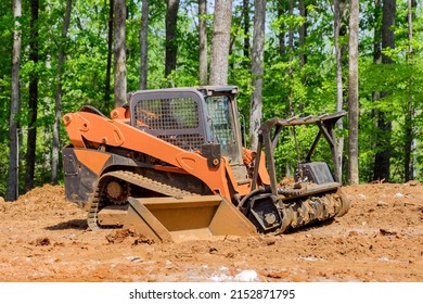 Heavy tractor machinery align the land for construction site