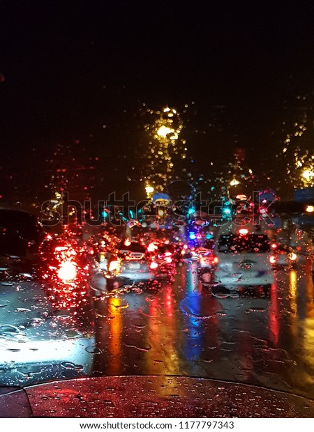 heavy traffic jam in the\
rainy night